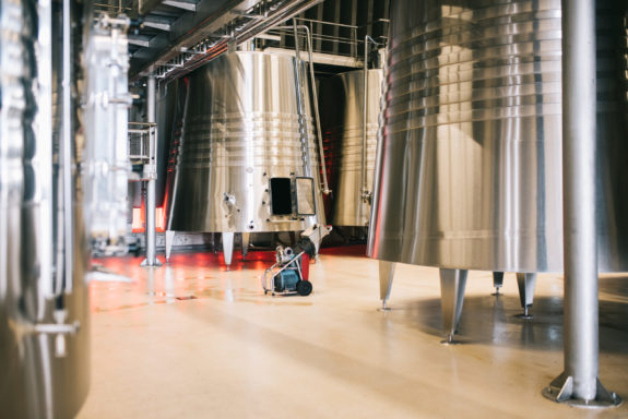 Modern winery with big steel barrels